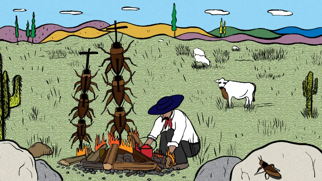 A man on a prairie is bent over a fire cooking dinner, but instead of meat he has insects on the barbecue