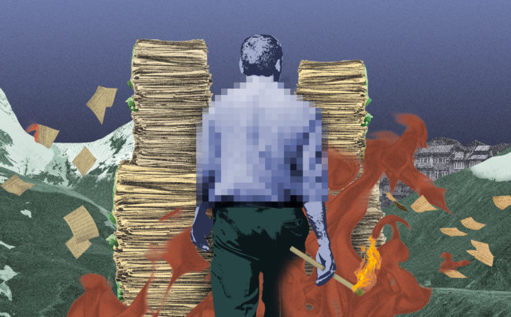 A man with a match in his hands walks towards stacks of documents in a mountainous region (Kashmir)