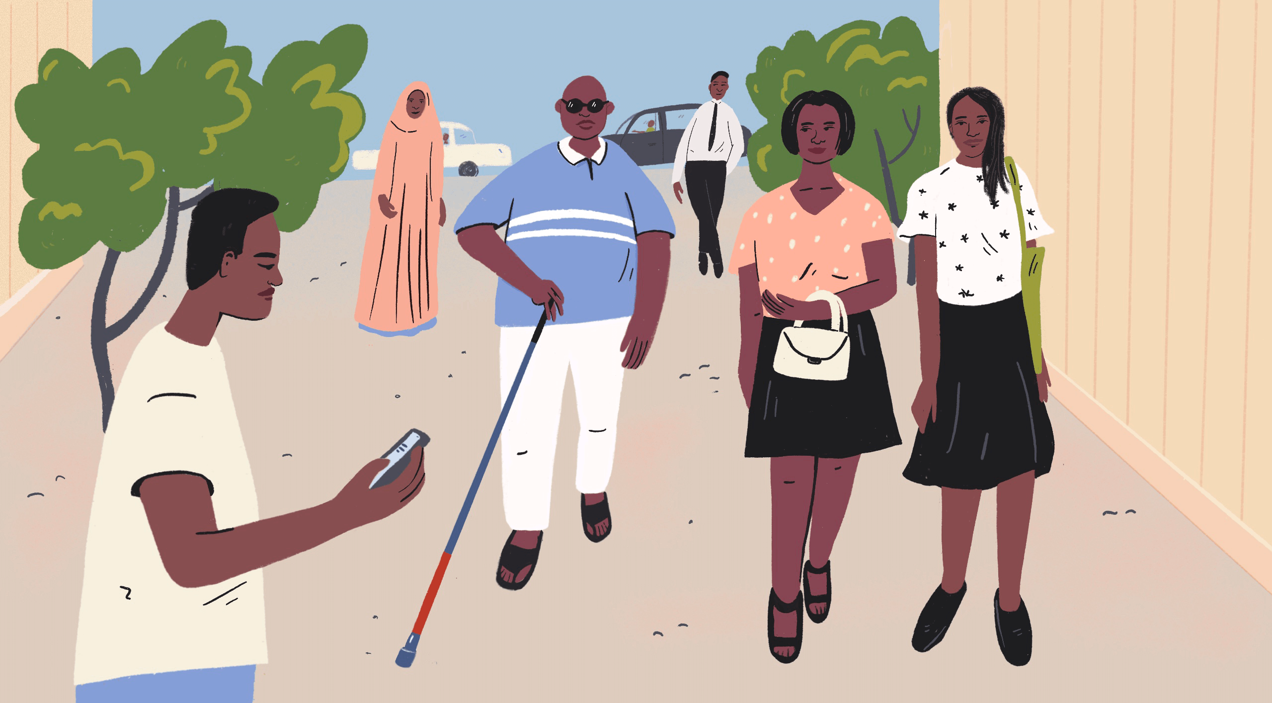 Several people walk down a street in Nigeria, a young man, two women side by side, one man has a walking stick and sunglasses.