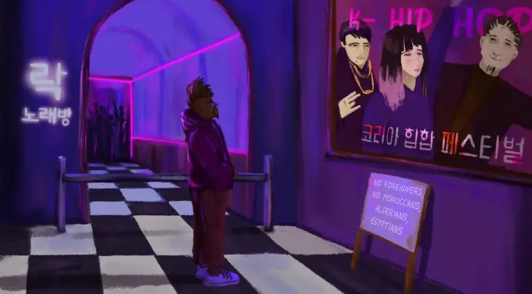 A Black man stands in front of a club entrance where a sign says its K-hip hop night. Below that, a sign reads, "no foreigners, no Moroccans, Egyptias, Algerians"