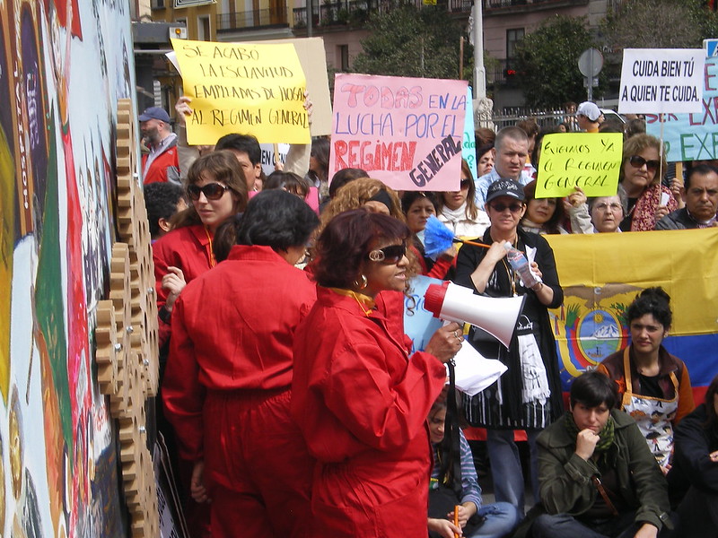 Rafaela Pimentel spoke with a megaphone at the first demonstration for domestic and care workers’ rights in Madrid on 28 March 2010. Photo: Olga Berrios/Flickr/CC BY 2.0